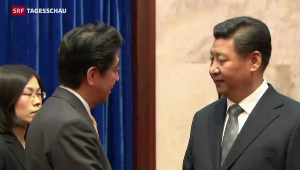 Handschlag zwischen Japan und China