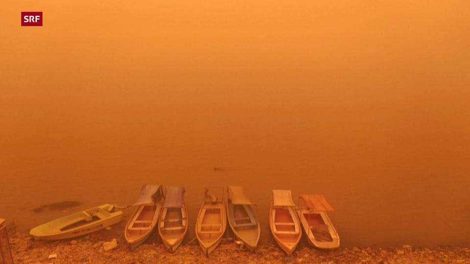 Heftige Sandstürme färben den Himmel in Bagdad orange