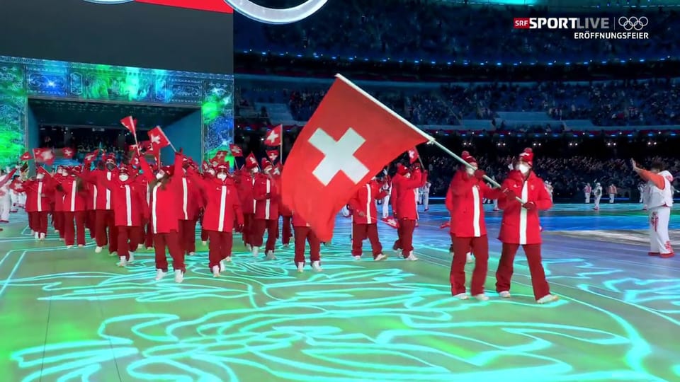 La delegaziun svizra arriva en il stadion olimpic
