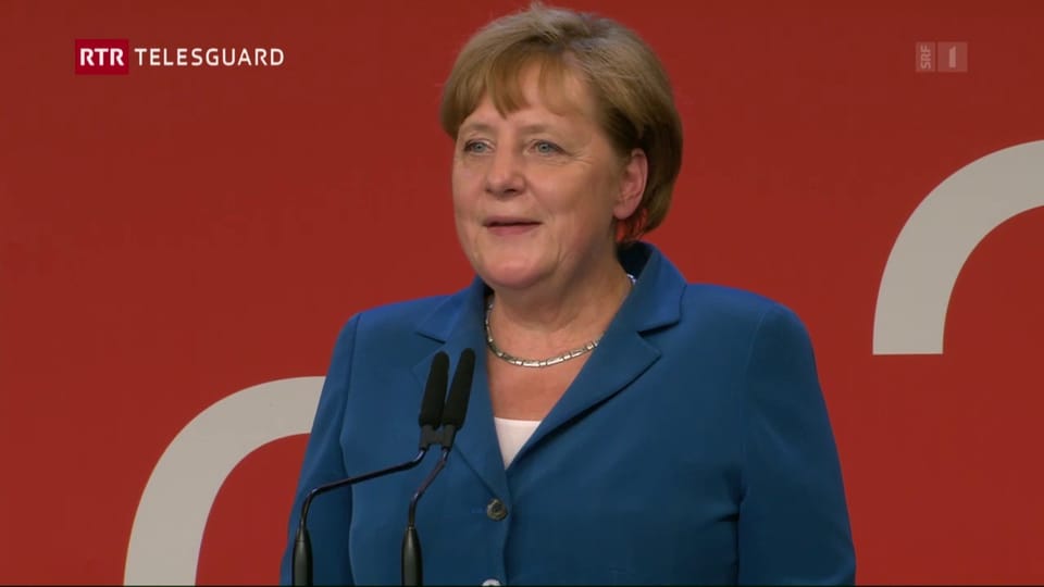 Schefs da stadi laudan la Svizra, tranter auter er Angela Merkel