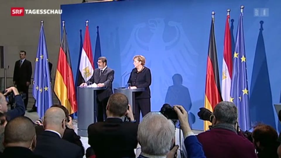Mursi bei Merkel