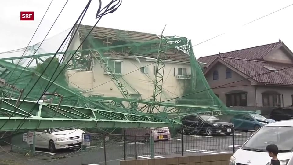 Donns dal taifun en la regiun da Tokio