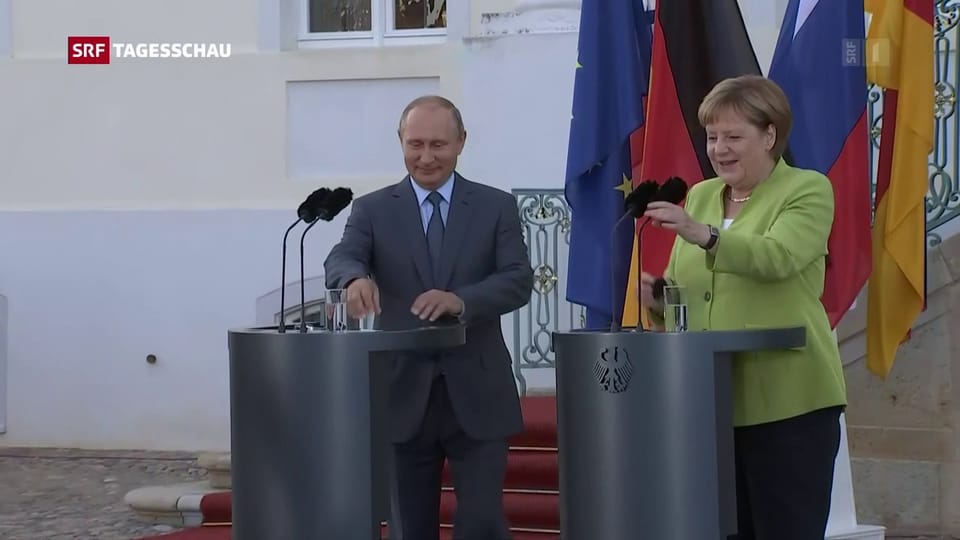 Merkel und Putin vor dem Treffen