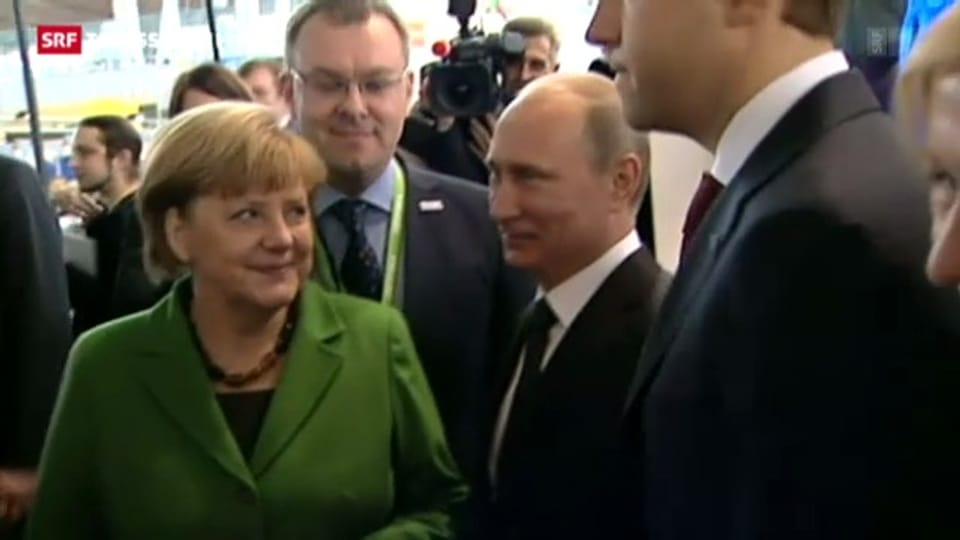 Putin trifft Merkel