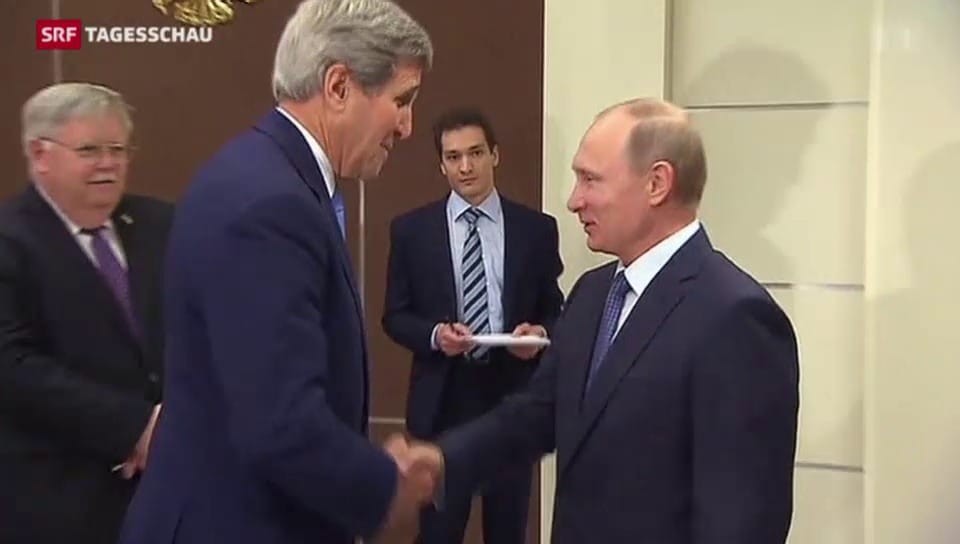John Kerry trifft Putin
