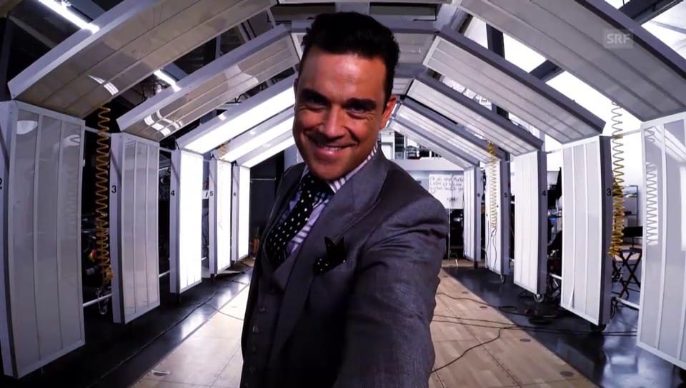 Robbie Williams spricht neu deutsch