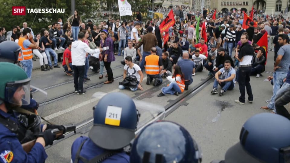 Demonstranten und Polizisten verletzt