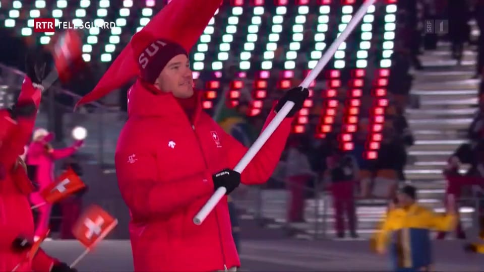 Dario Cologna ha purtà la bandiera a l’avertura dals gieus olimpics