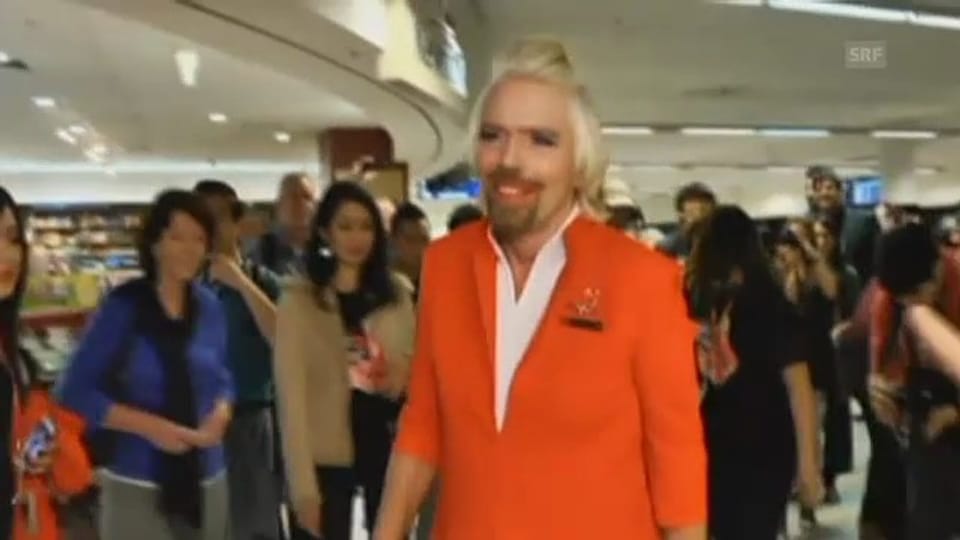 Richard Branson als sexy Stewardess